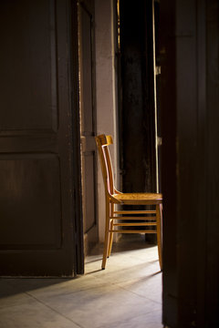 Wood Chair in Church Doorway