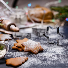 Christmas ginger cookies on a black background, vertically, square,