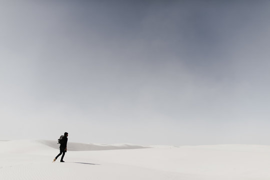 Man walking alone in desert