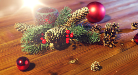 christmas fir branch decoration and candle lantern