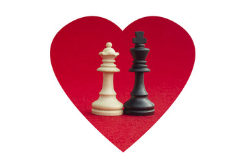 White queen and black king, traditionally confronted in chess game, have reconciled. Image in...