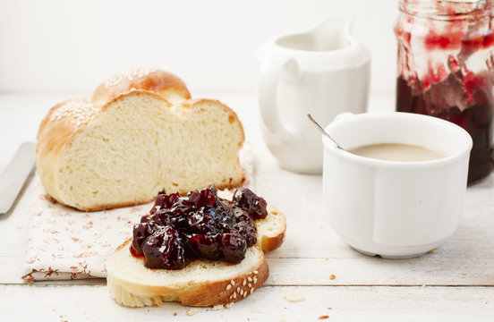 Breakfast challah with cranberry jam and coffee