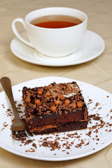 Chocolate cake and a cup of tea.