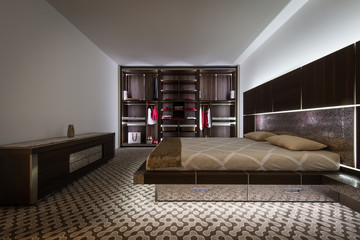 Modern bedroom with double bed and built in closet