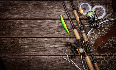 Zelfklevend Fotobehang Fishing tackle background. © vitaliy_melnik