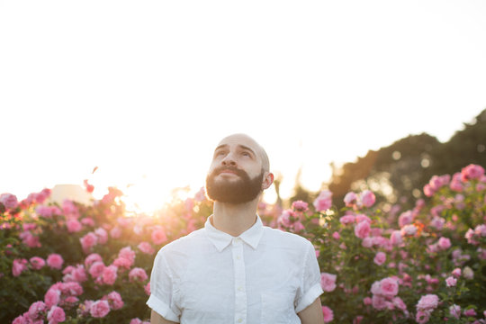Young Bearded Man with Flowers
