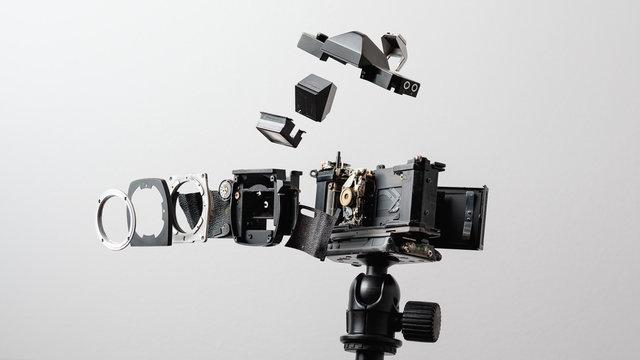 Deconstructed Analog Camera on a Tripod
