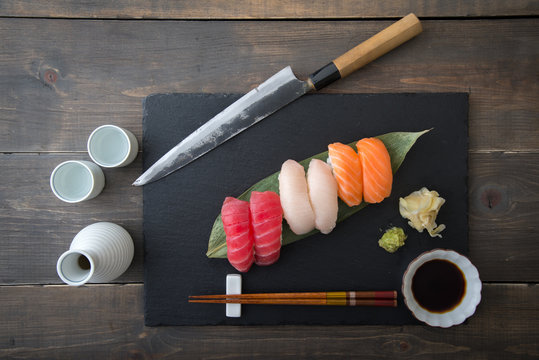 sushi platter with sashimi knife