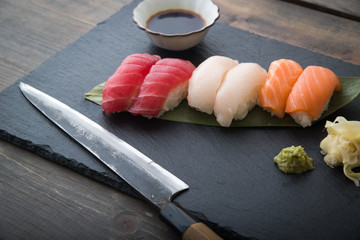 sushi platter with sashimi knife