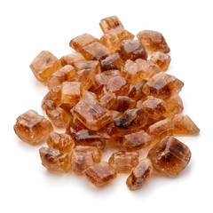 Brown caramelized lump cane sugar cube isolated on white background cutout