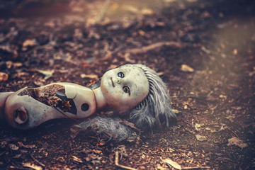 A broken doll in an abandoned kindergarten in the village of Kopachi, Chernobyl District, a zone of...