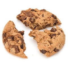 One broken Chocolate chip cookie isolated on white background. Sweet biscuit crumbs. Homemade pastry.