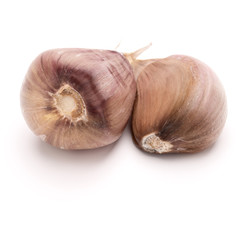 Two garlic cloves isolated on white background cutout