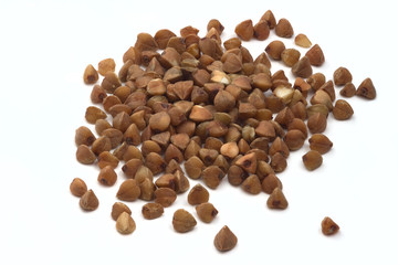 buckwheat on a white background strewn with a slide