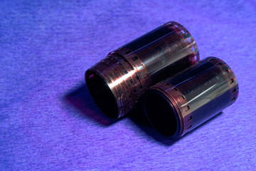 Old photo film on a blue background, close