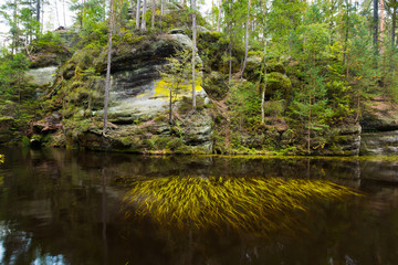 Small lake in the rock mountain Adrspasske skaly, Czech republic