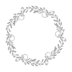 Seasonal wreath with leaves, oranges and nuts