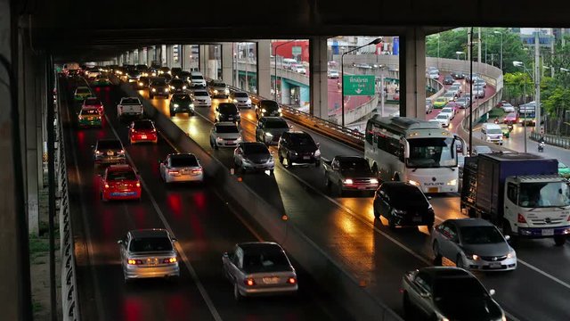 Night timelapse of traffic jam on the road at Lat Phrao Square in Bangkok, Thailand. Ladprao is one of the most busiest street in rush hour in Thailand