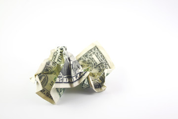 Crushed one dollar bill close up isolated