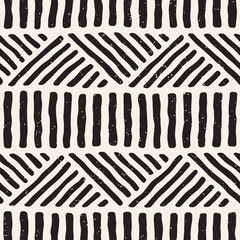 Hand drawn style ethnic seamless pattern. Abstract geometric tiling background in black and white.