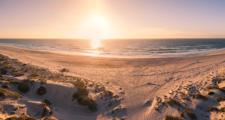 Aerial view of beach at sunset
