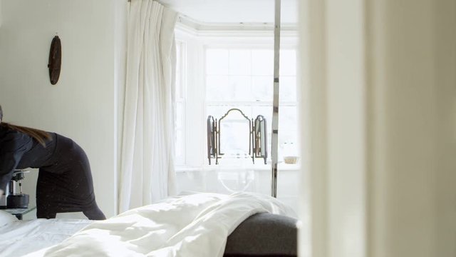 Chambermaid Making Bed In Boutique Hotel Shot On R3D