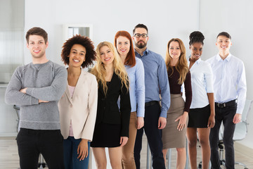 Smiling Multiracial College Students Standing In Row