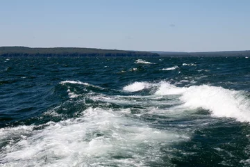 Zelfklevend Fotobehang Wake of a boat on Lake Superior © karagrubis