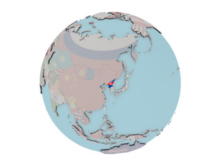 Obraz premium North Korea with flag on globe