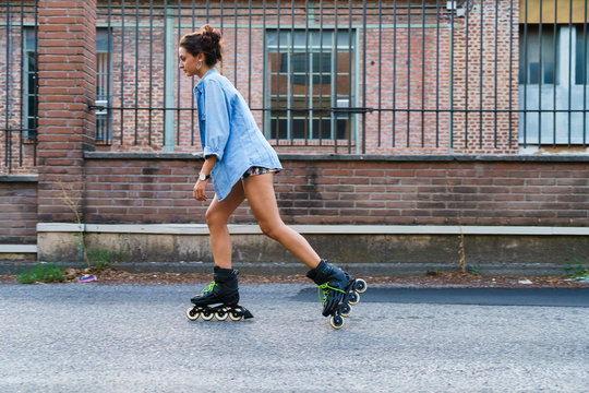 Expressive girl roller skating