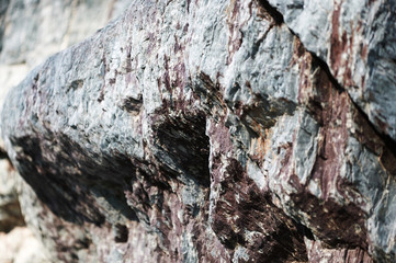 Rock of slate, the structure of the stone is a complex relief.