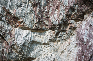 Rock of slate, the structure of the stone is a complex relief.