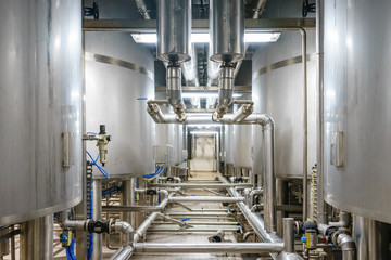 Stainless steel mixing tank on production line in pharmacy and beverage industry manufacture factory