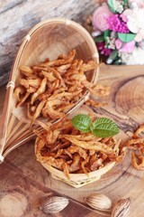 Fried fish is tasty on wood background