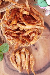Fried fish is tasty on wood background