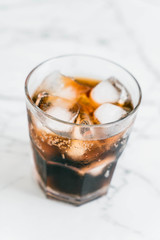 glass of cola with ice