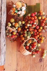 Fresh tomatoes for cooking on wood background