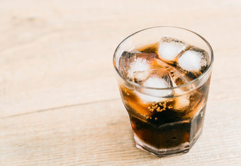 glass of cola with ice