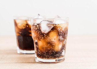 glass of cola with ice
