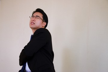 Man is having officeSyndrome is caused by unhealthy habits and misuse of muscle, such as staying in the same posture for a prolonged period without sufficient movement. Headaches, shoulder and back pa