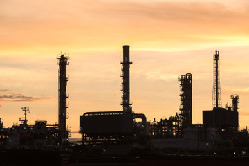 Fototapeta na wymiar Oil and gas refinery industry Factory at sunset