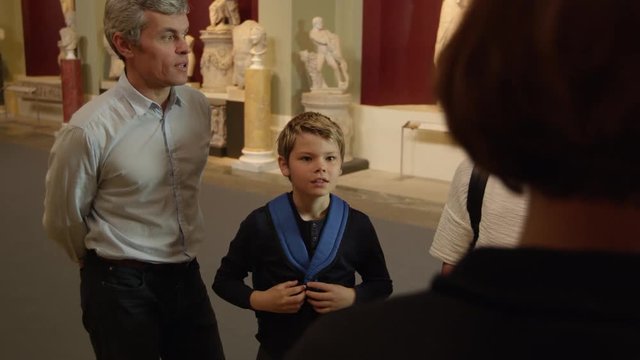 Pupils On School Field Trip To Museum With Guide Shot On R3D