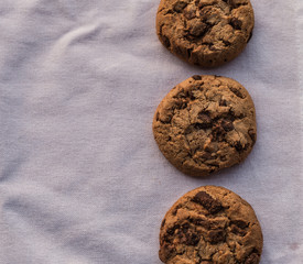 Closeup chocolate chips cookies on white background