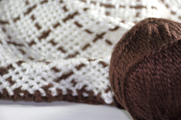 colorful knitted garments and blankets, comb loom