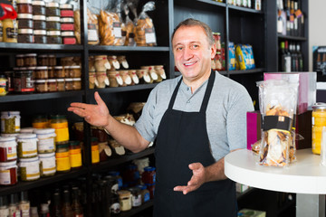 man standing near counter