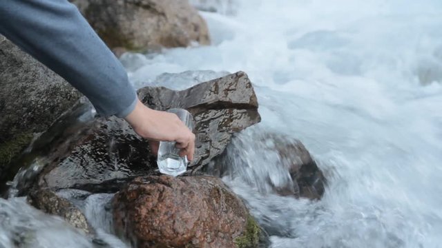 glass crystal clear water of the mountain river