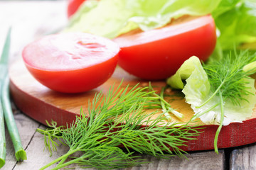 Ingredients of salad with tomatoes