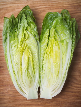 Romaine lettuce on kitchen board
