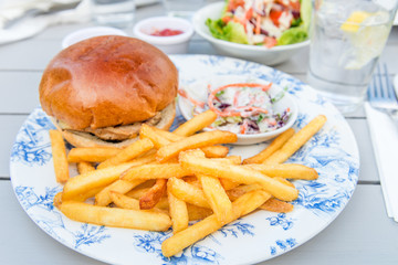 Burger and Chips with Coleslow Salad