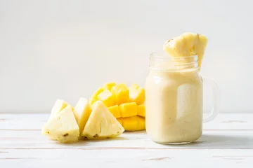 Papier Peint photo autocollant Milk-shake Mango, Banana, Pineapple and Oatmeal Smoothie in the Jar